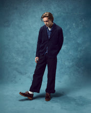 Full view of man wearing the #3044 knitted blazer in midnight blue with matching pants.