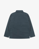 Back view of Uskees blueberry ripstop field jacket showing the modern military silhouette.