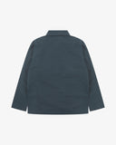 Back view of Uskees blueberry ripstop field jacket showing the modern military silhouette.