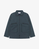 Front view of Uskees blueberry ripstop field jacket showing the chest zip pockets and gusseted pockets with flaps.