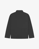 Flat back view of Uskees charcoal cotton drill men's jacket on a light gray background