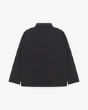 Back view of Uskees black ripstop utility jacket showing the modern military silhouette.