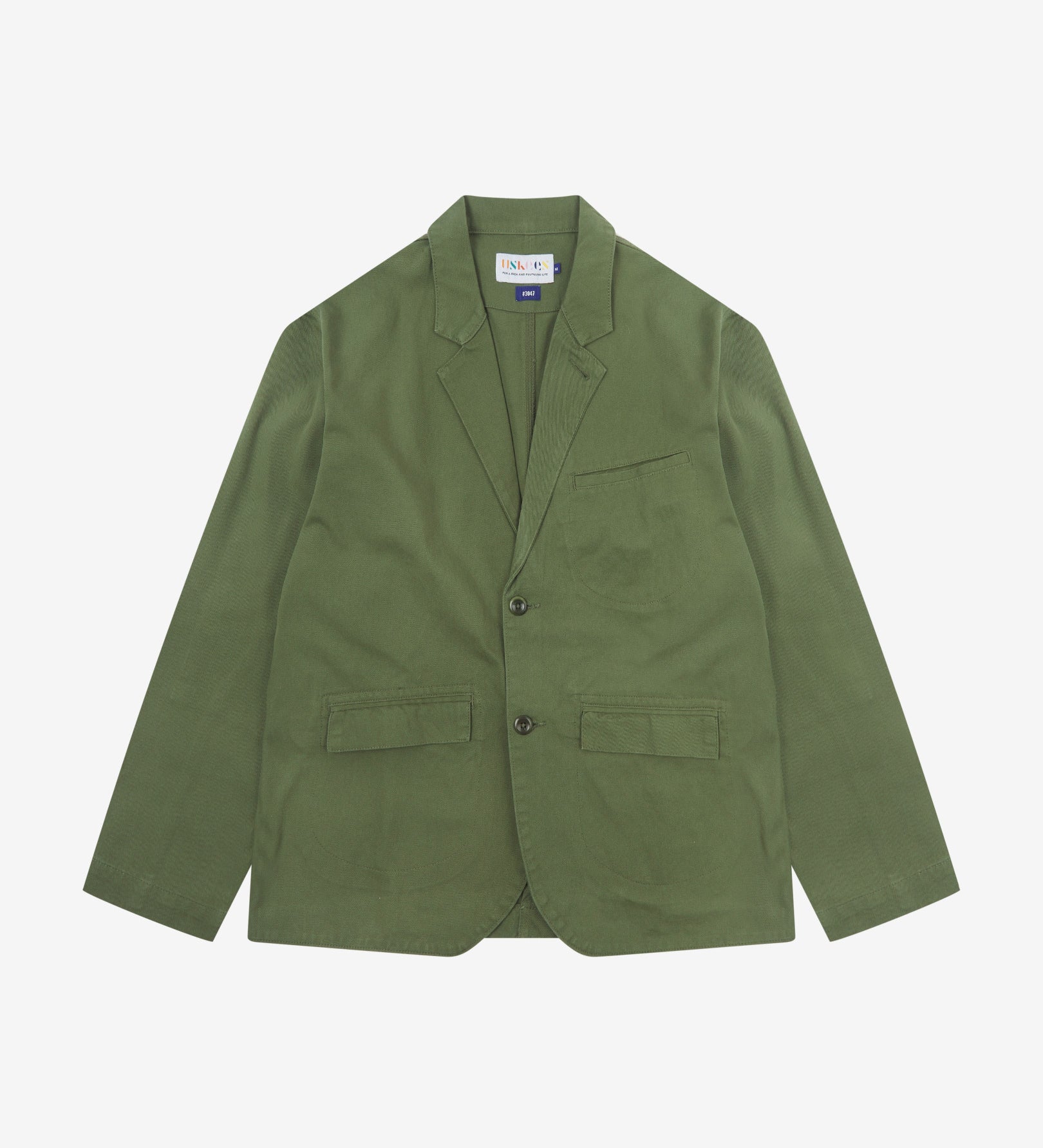 Full front view of organic cotton twill coriander-green docklands blazer from Uskees. Clearly showing 2-button fastening, 3 jetted pockets and brand labels.