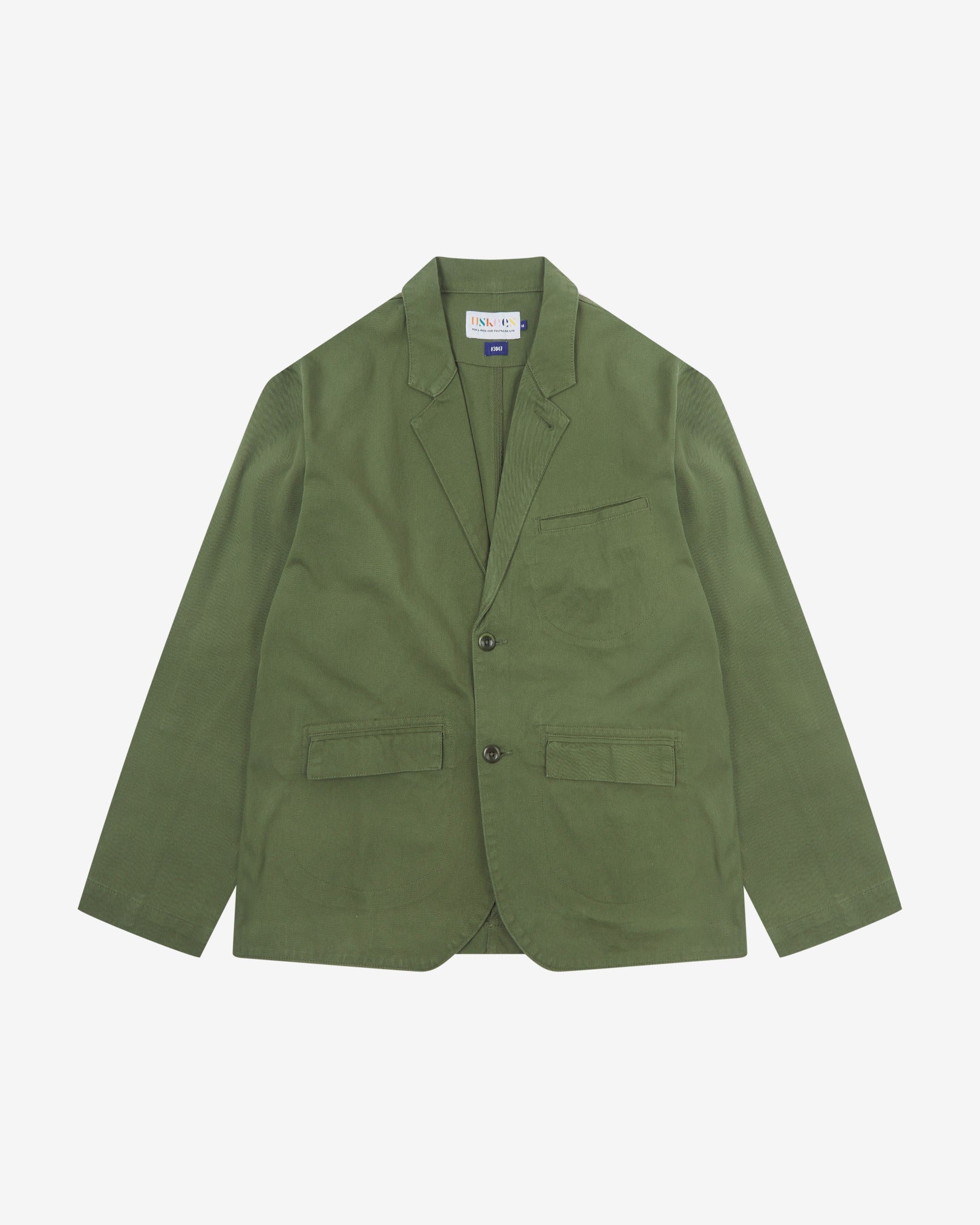 Full front view of organic cotton twill coriander-green docklands blazer from Uskees. Clearly showing 2-button fastening, 3 jetted pockets and brand labels.