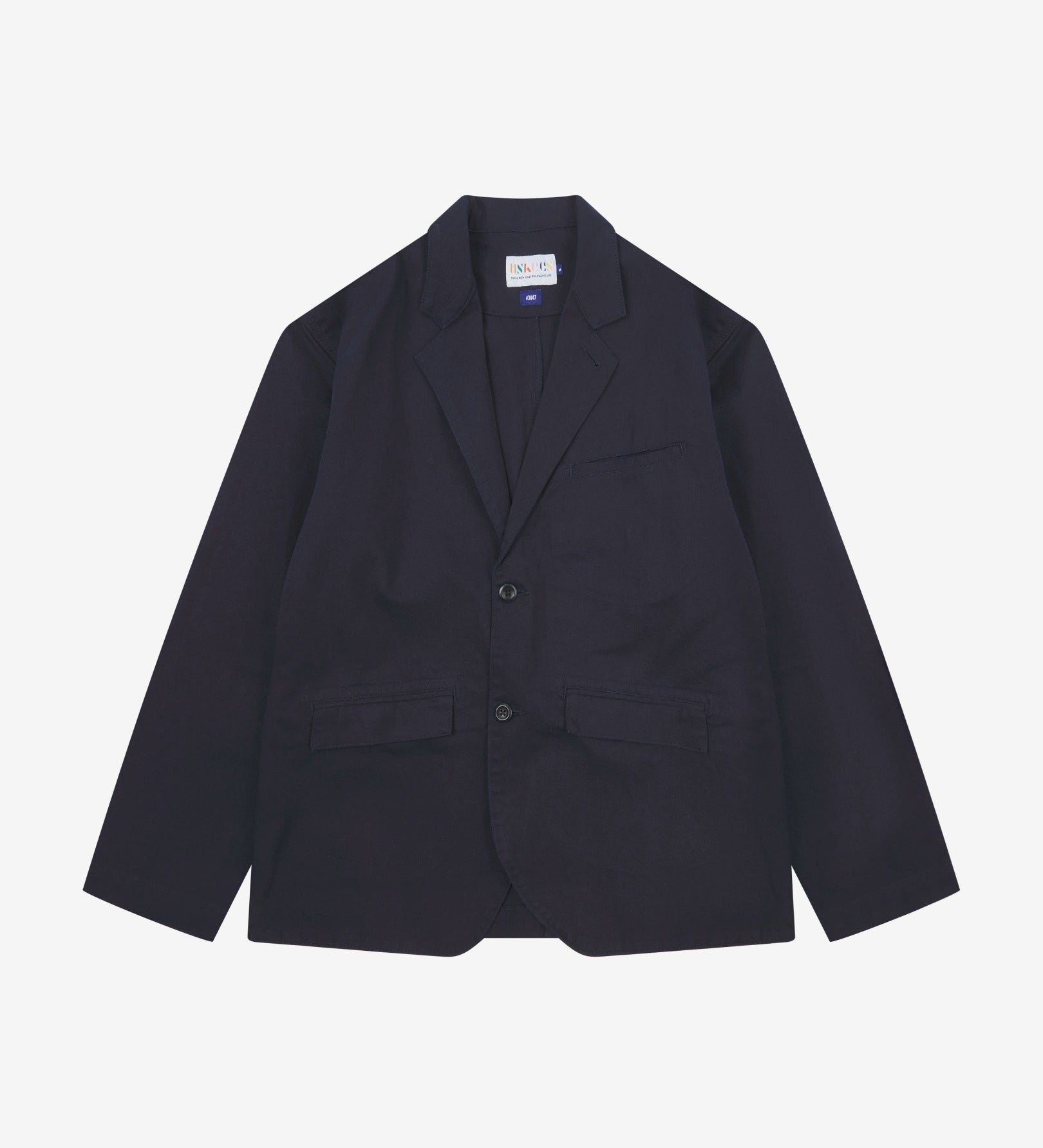 Full front view of organic cotton twill deep blue docklands blazer from Uskees. Clearly showing 2-button fastening, 3 jetted pockets and Uskees brand labels.