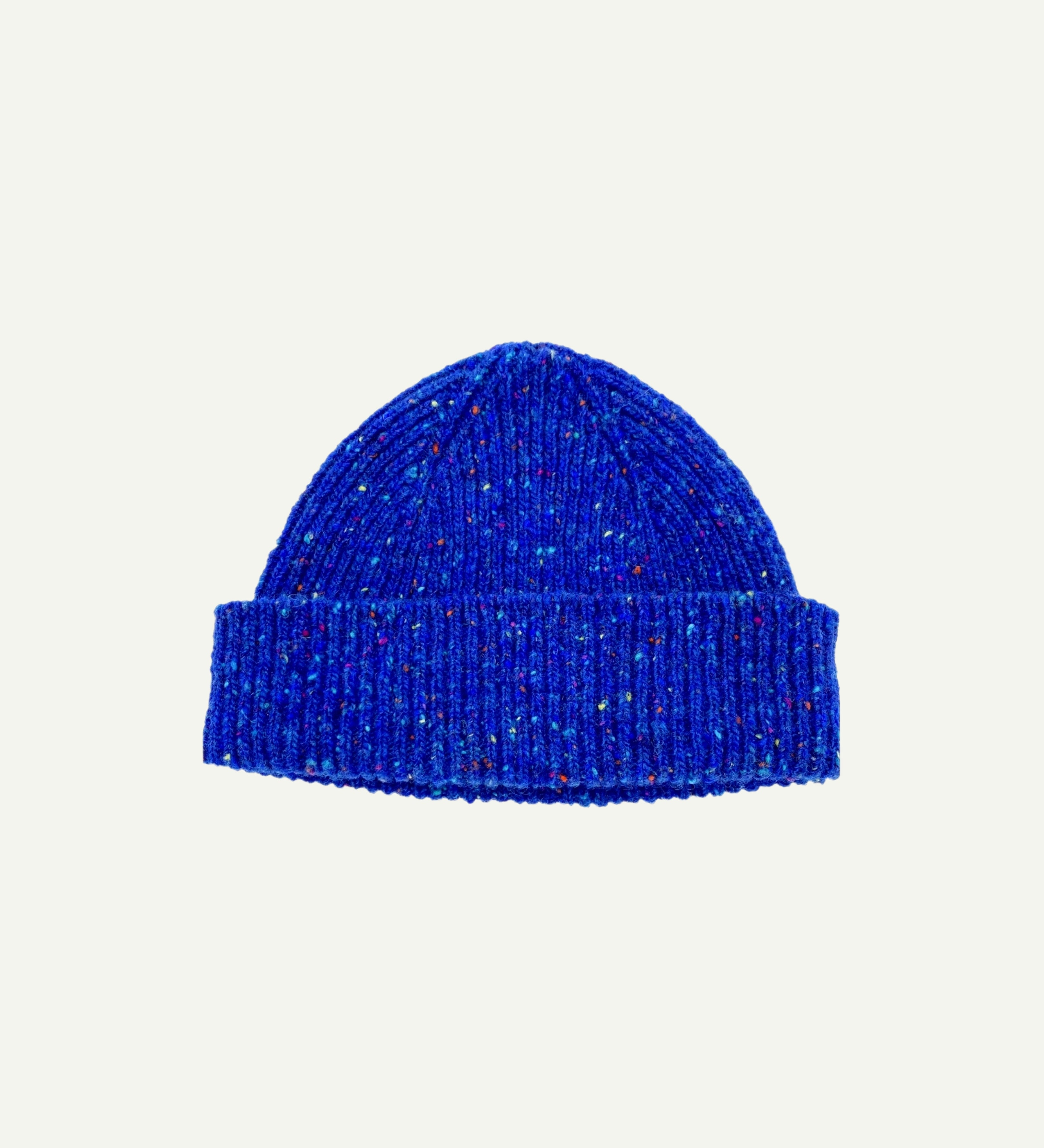  Flat view of Uskees 4003 donegal wool hat in 'ultra blue' . The image clearly shows the adjustable cuff of this bright blue hat.