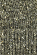 Close-up view of Uskees 4003 'army green' speckled donegal wool hat, showing the texture of the natural Scottish merino wool.