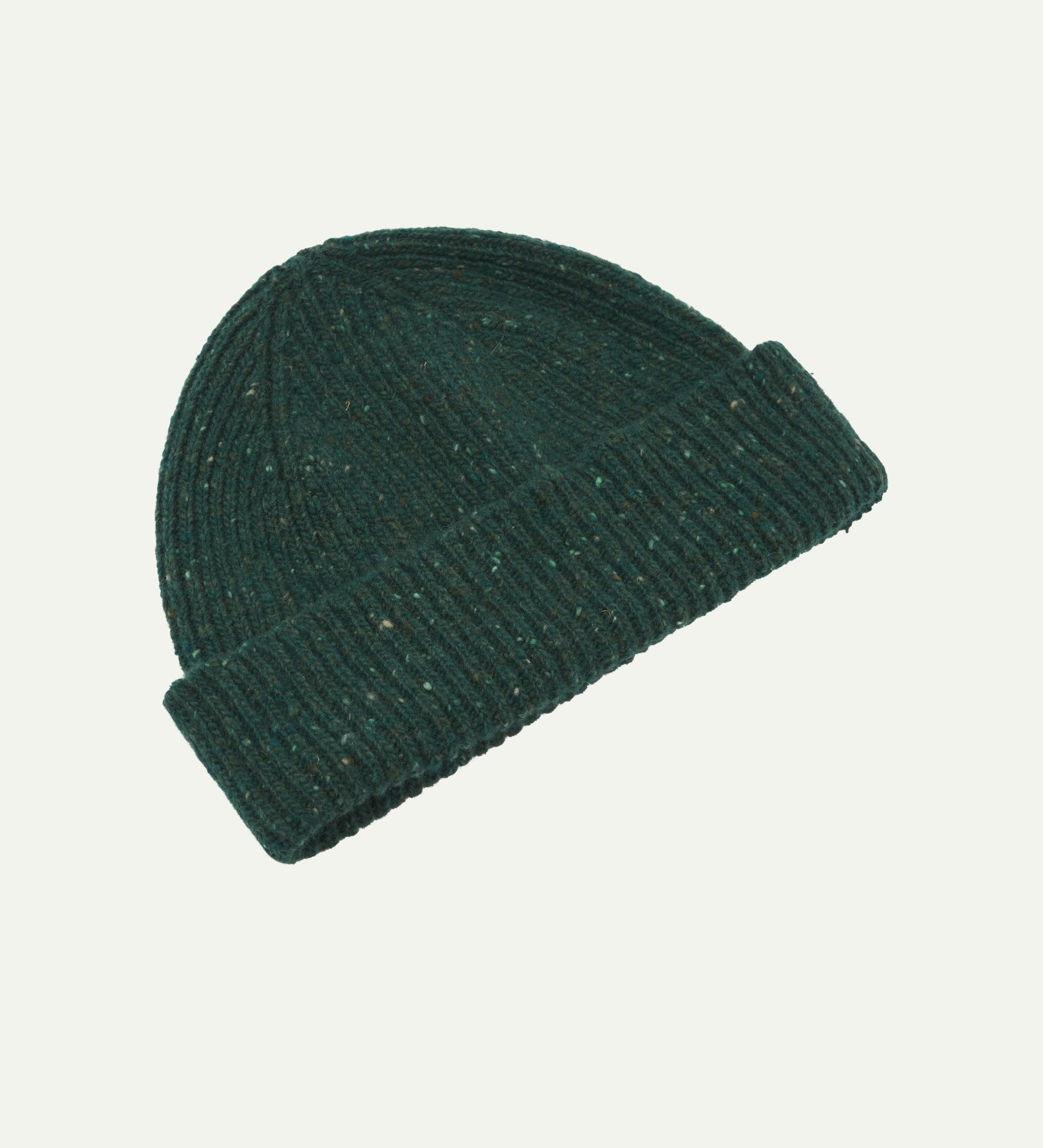 Angled back view of Uskees 4003 'mallard green' speckled donegal wool hat showing the adjustable cuff.