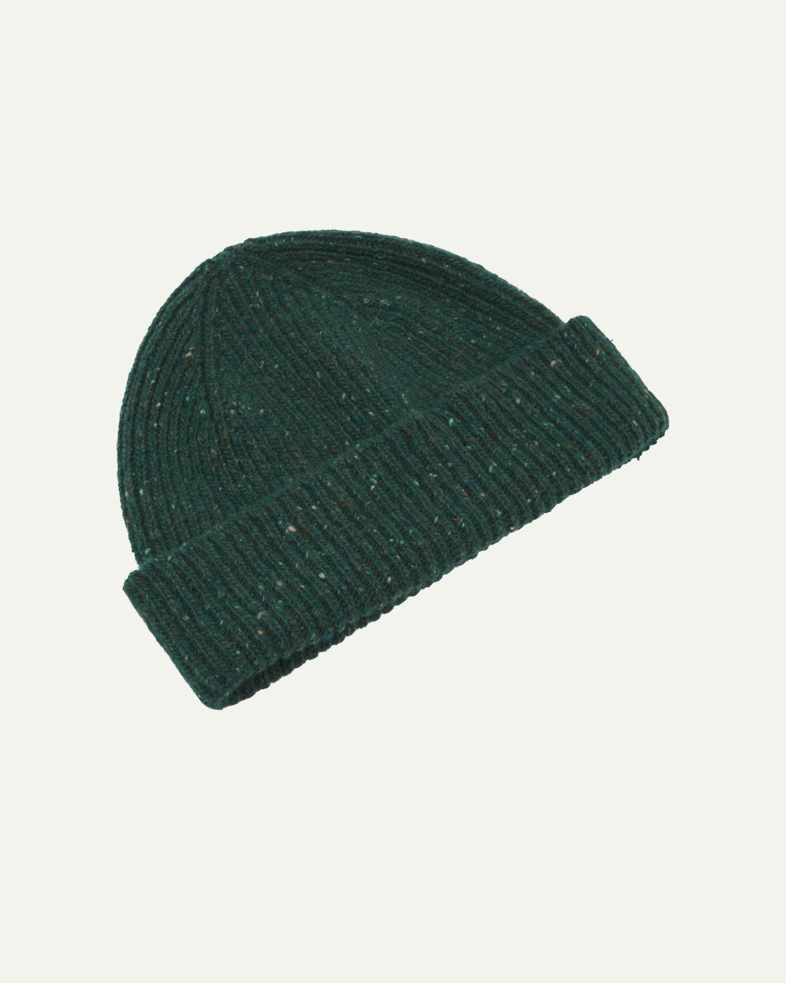 Angled back view of Uskees 4003 'mallard green' speckled donegal wool hat showing the adjustable cuff.