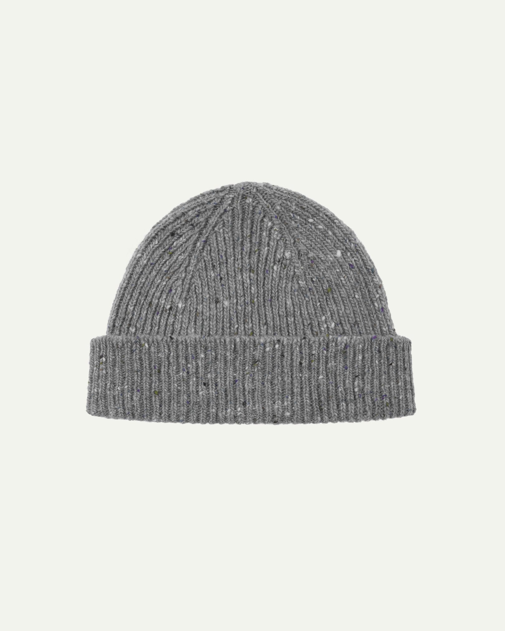 Flat view of Uskees 4003 'silver-grey' speckled donegal wool hat, with a clear view of the 'speckled' nature of the hat and the adjustable cuff.