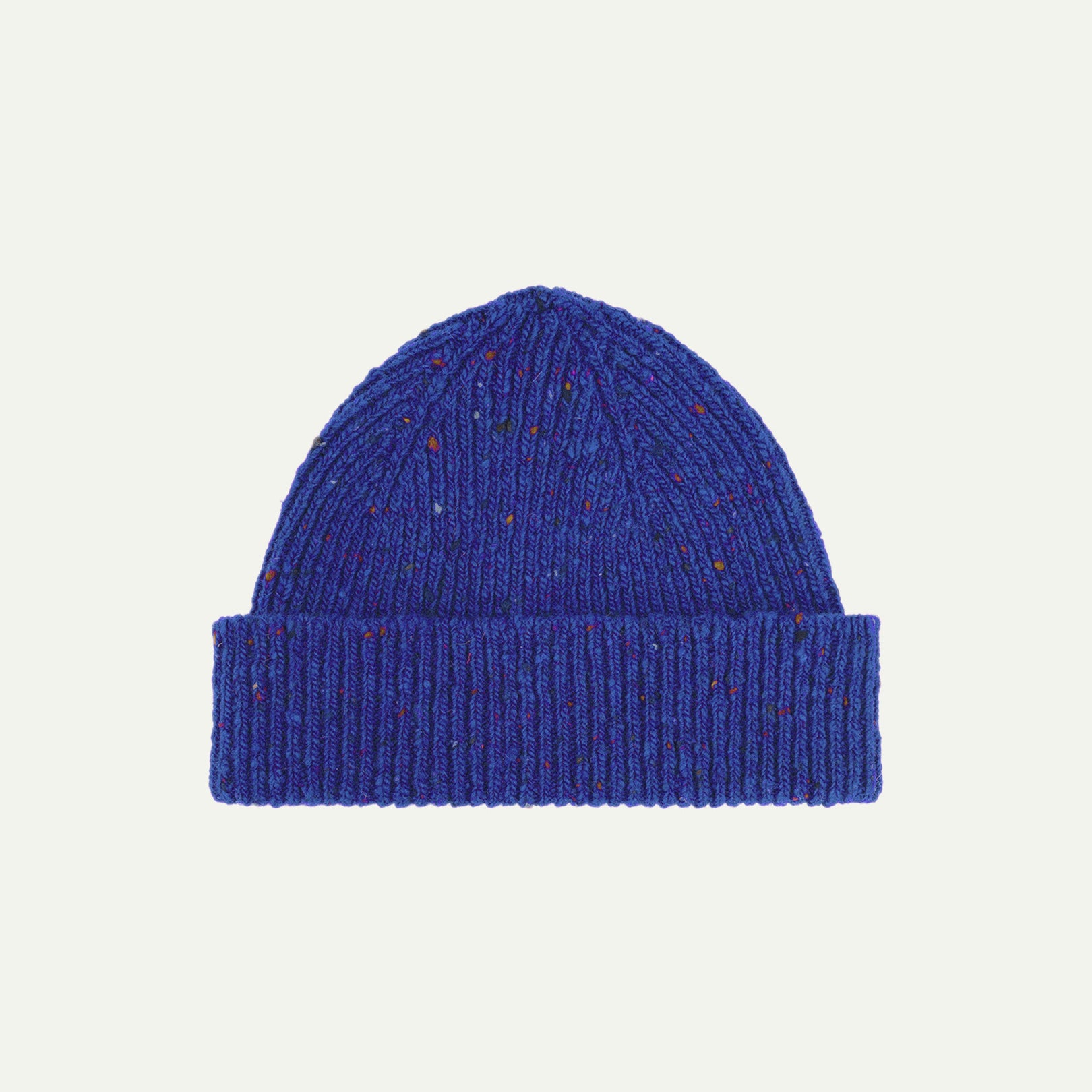  Flat view of Uskees 4003 donegal wool hat in 'ultra blue' . The image clearly shows the adjustable cuff of this bright blue hat.