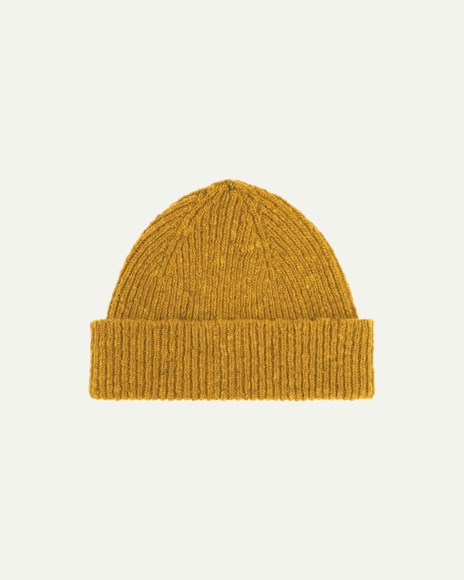 Flat view of Uskees 4003 donegal wool hat in yellow, with a clear view of the adjustable cuff.