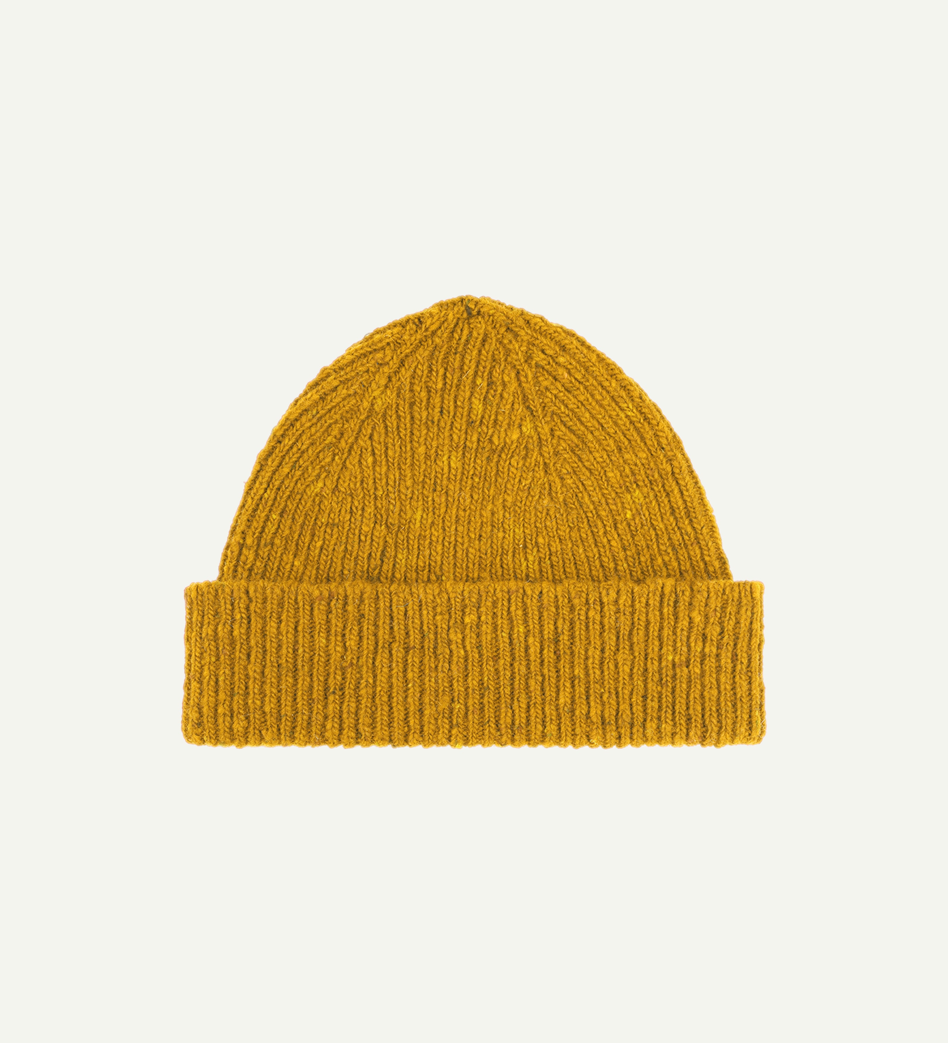  Flat view of Uskees 4003 donegal wool hat in yellow, with a clear view of the adjustable cuff.