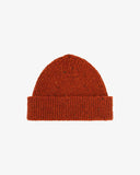 Flat view of Uskees 4003 'burnt orange' donegal wool hat, with a clear view of the adjustable cuff. Clearly showing the 'speckled' detail of the wool hat.