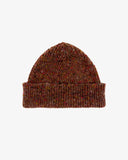 Flat view of Uskees 4003 'brick red' speckled donegal wool hat, with a clear view of the 'speckled' nature of the hat and the adjustable cuff.