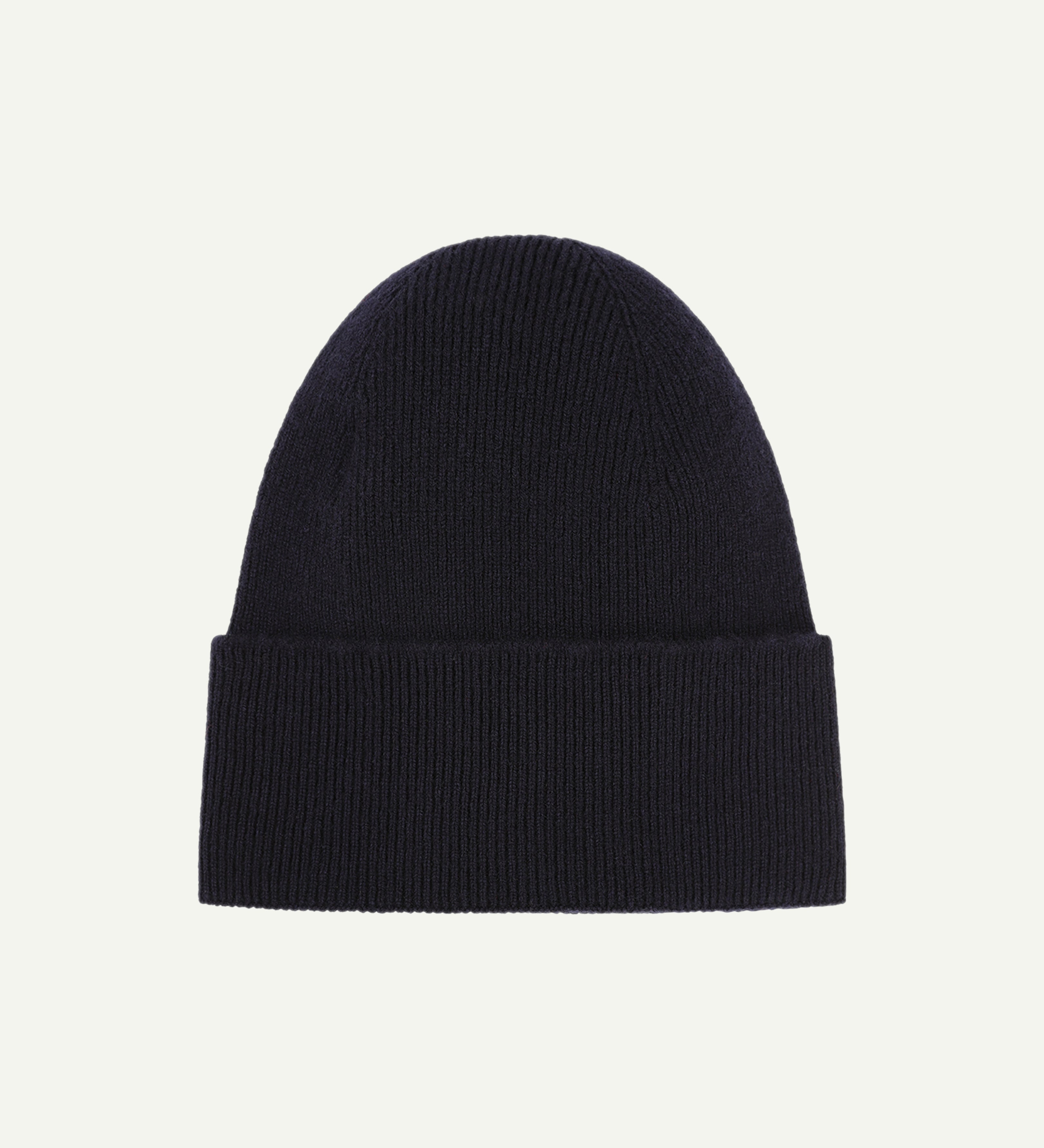 Flat view of Uskees 4004 navy blue wool hat, showing a clear view of the adjustable cuff and the ribbed texture of the hat.