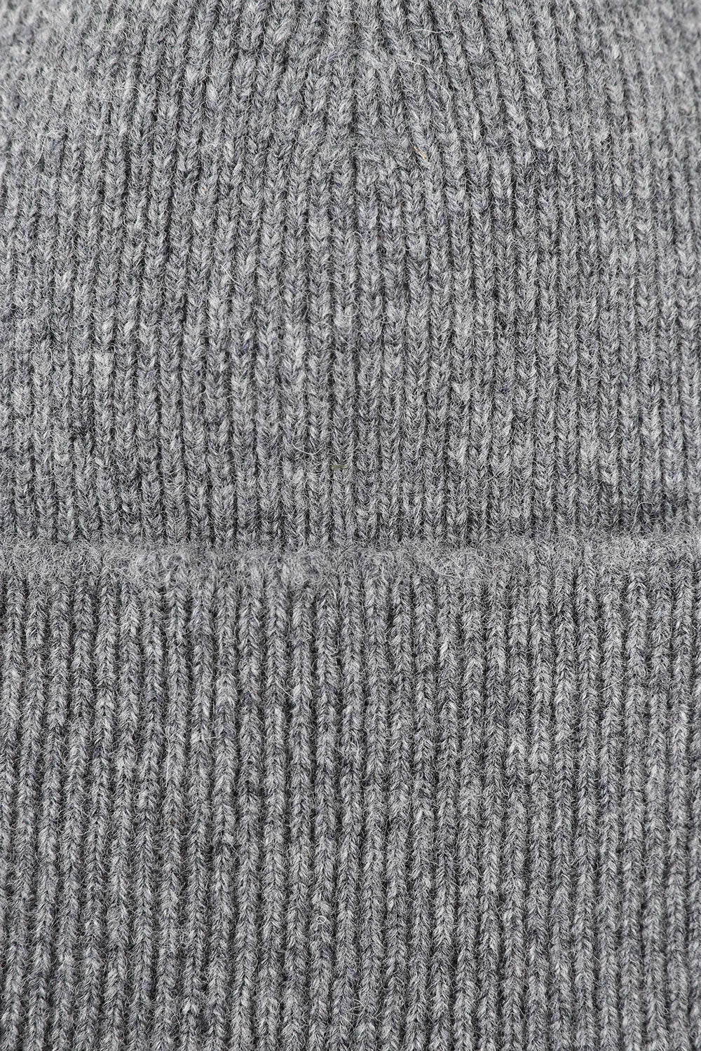 Close-up view of Uskees 4004 grey wool hat, showing the texture of the natural lambswool.