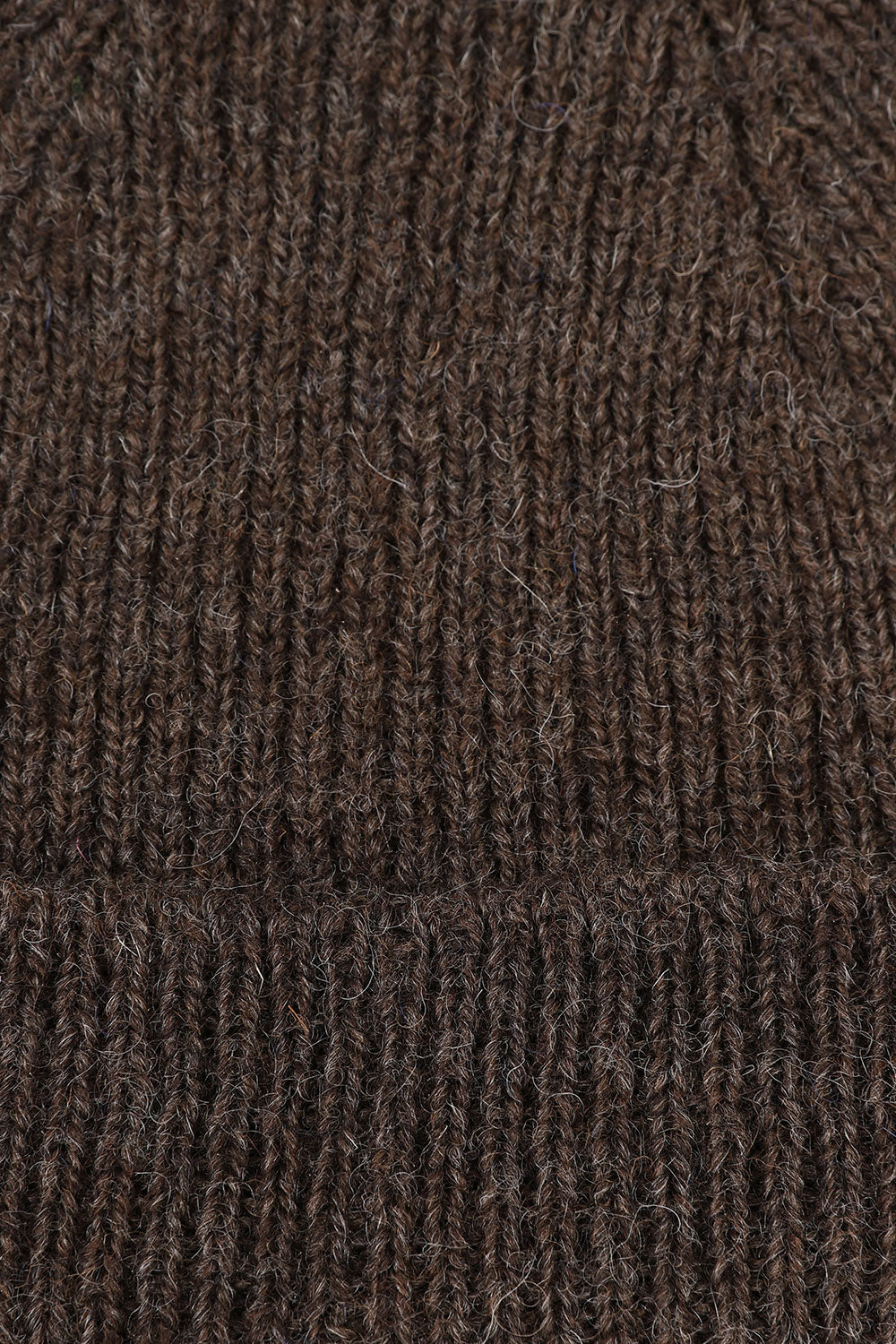 Close-up view of Uskees 4005 'bran' brownish wool hat, showing the texture of the Bluefaced Leicester and Masham wool blend.