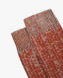 Closer look at the upper portion of the Uskees 4006 alpine brown organic cotton sock, showing the ribbing and the random parallel knitting pattern.