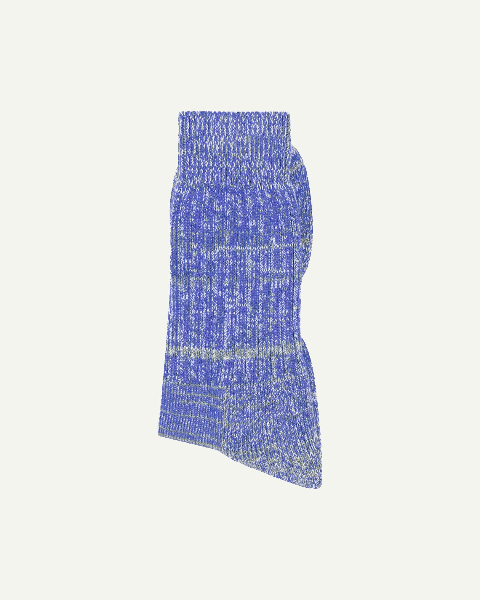 Folded shot of Uskees 4006 organic cotton socks in ultra blue, showing random parallel knitting pattern.