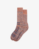Pair of Uskees Men's socks in orange stripe pattern on a white background