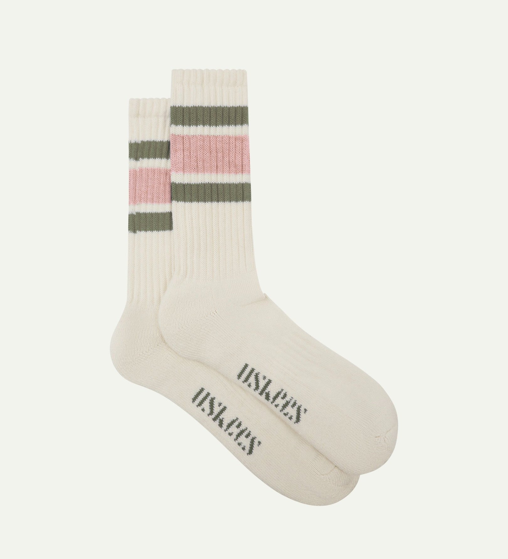 Flat view of a pair of Uskees 4011 dusty pink, organic cotton, college stripe socks, showing coloured bands and the Uskees branding at the base of each sock.