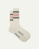 Flat view of a pair of Uskees 4011 dusty pink, organic cotton, college stripe socks, showing coloured bands and the Uskees branding at the base of each sock.