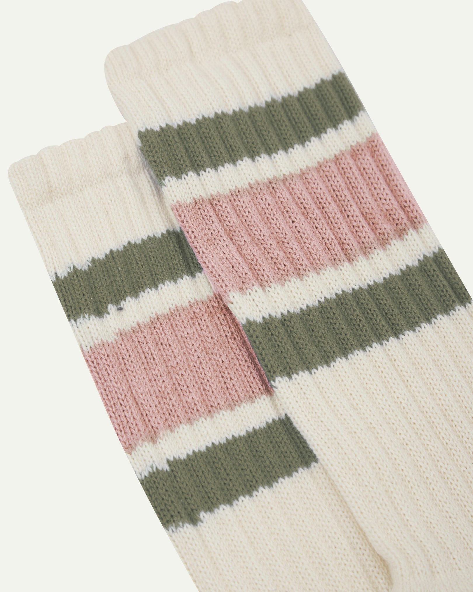 Closer view of the upper leg of a pair of Uskees 4011 socks, showing the 'college stripes' comprising of two olive green and one thicker dusty pink band.