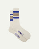 Flat view of a pair of Uskees 4011 khaki, organic cotton, college stripe socks, showing coloured bands and the Uskees branding at the base of each sock.