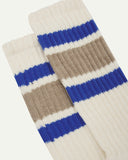 Closer view of the upper leg of a pair of Uskees 4011 socks, showing the 'college stripes' comprising of two ultra blue and one thicker khaki band.