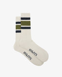 Flat view of a pair of Uskees 4011 olive, organic cotton, college stripe socks, showing coloured bands and the Uskees branding at the base of each sock.