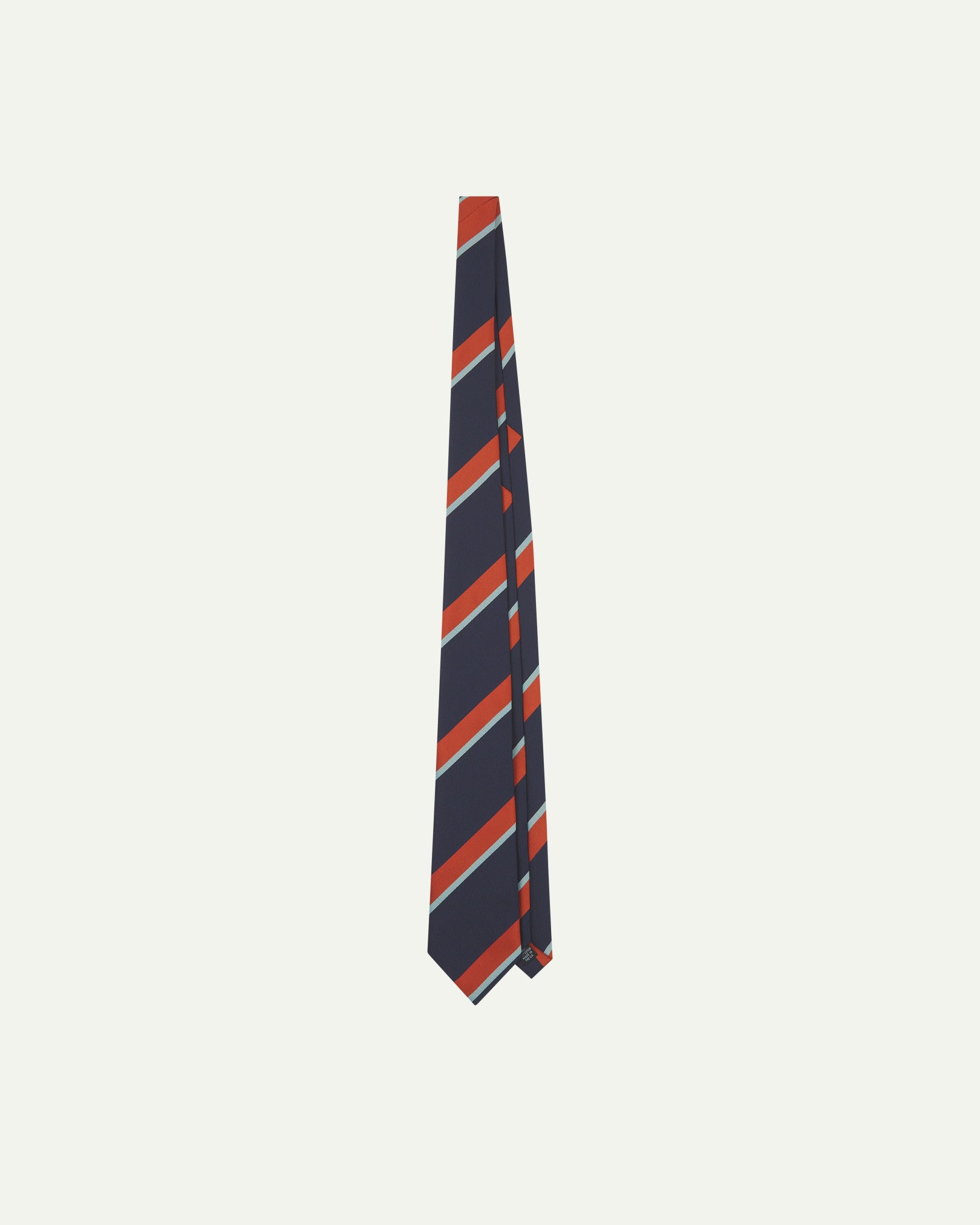 Full-length view of English-made recycled polyester repp tie in midnight blue from Uskees.