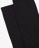 Focus on the rib of the black organic cotton blend  socks from Uskees.