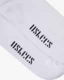 The sole of the 4015 white cotton socks with focus on the 'USKEES' branding