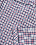 Uskees suburban navy/berry plaid pajama top showing the buttons, cuff and check pattern.
