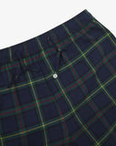 Uskees suburban blue/green check men's pyjama pants on a light gray background