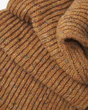 Close-up of the Donegal Merino wool scarf in speckled butterscotch, showing the ribbed texture and speckled coloured neps.