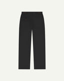 Full length back-view of black cotton 5005 trousers with view of rear pockets, belt loops and tapered leg fit.