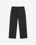 Full-length back view of Uskees 5005 twill workwear pants in black showing belt loops, back pockets (one with flap) and simple silhouette.