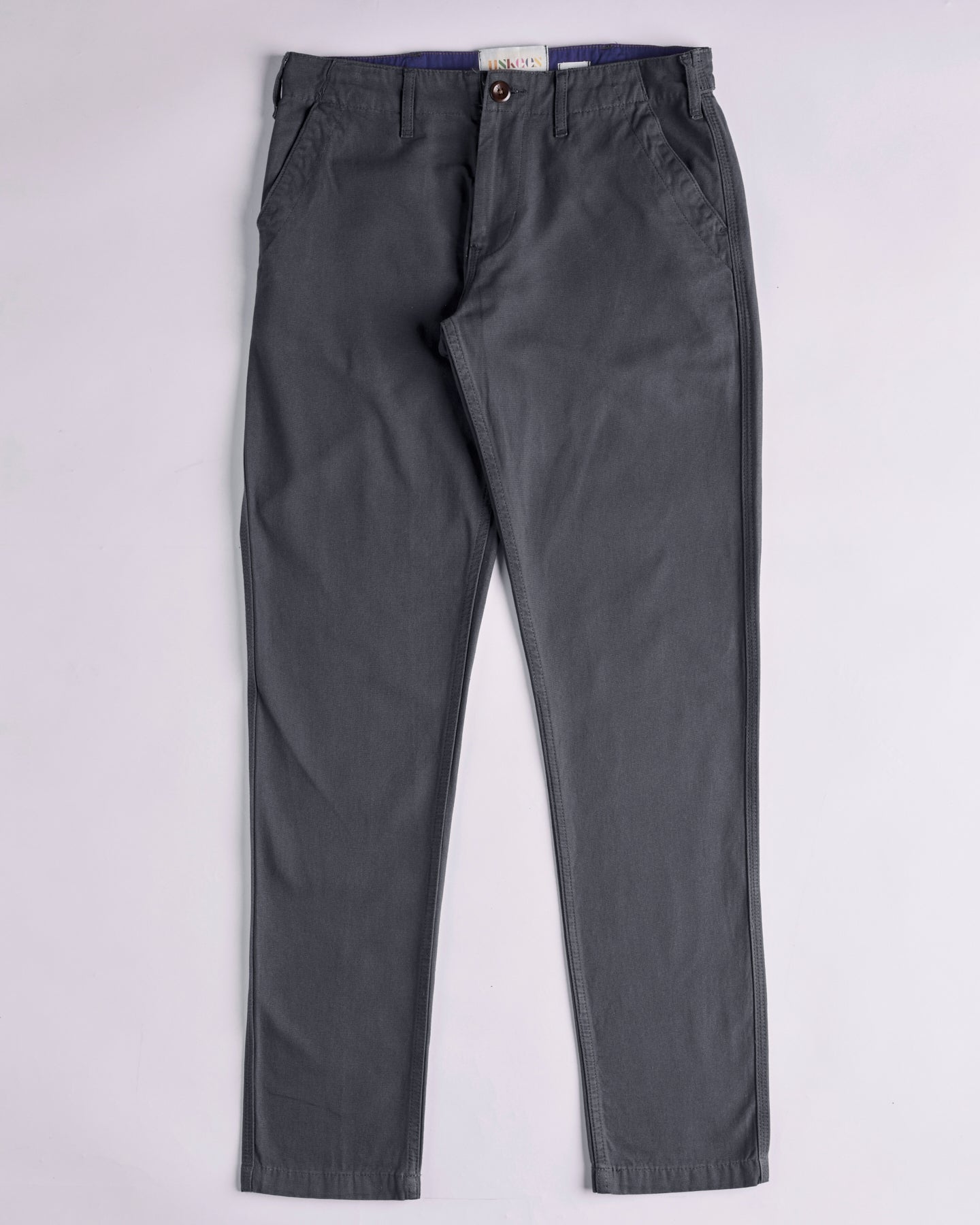 Front flat view of 5005 Uskees men's organic cotton charcoal-grey casual trousers showing flattering tapered leg fit. Discontinued colour.