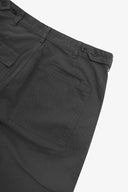 Close up back shot of Uskees 5005 twill workwear pants in charcoal-grey with focus on back pocket, adjustable waistband secured with Corozo button and belt loops.