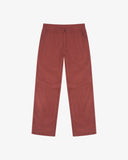 Full-length front view of Uskees drill workwear pants in chestnut-brown. Showing Corozo button fastening and tapered leg fit.