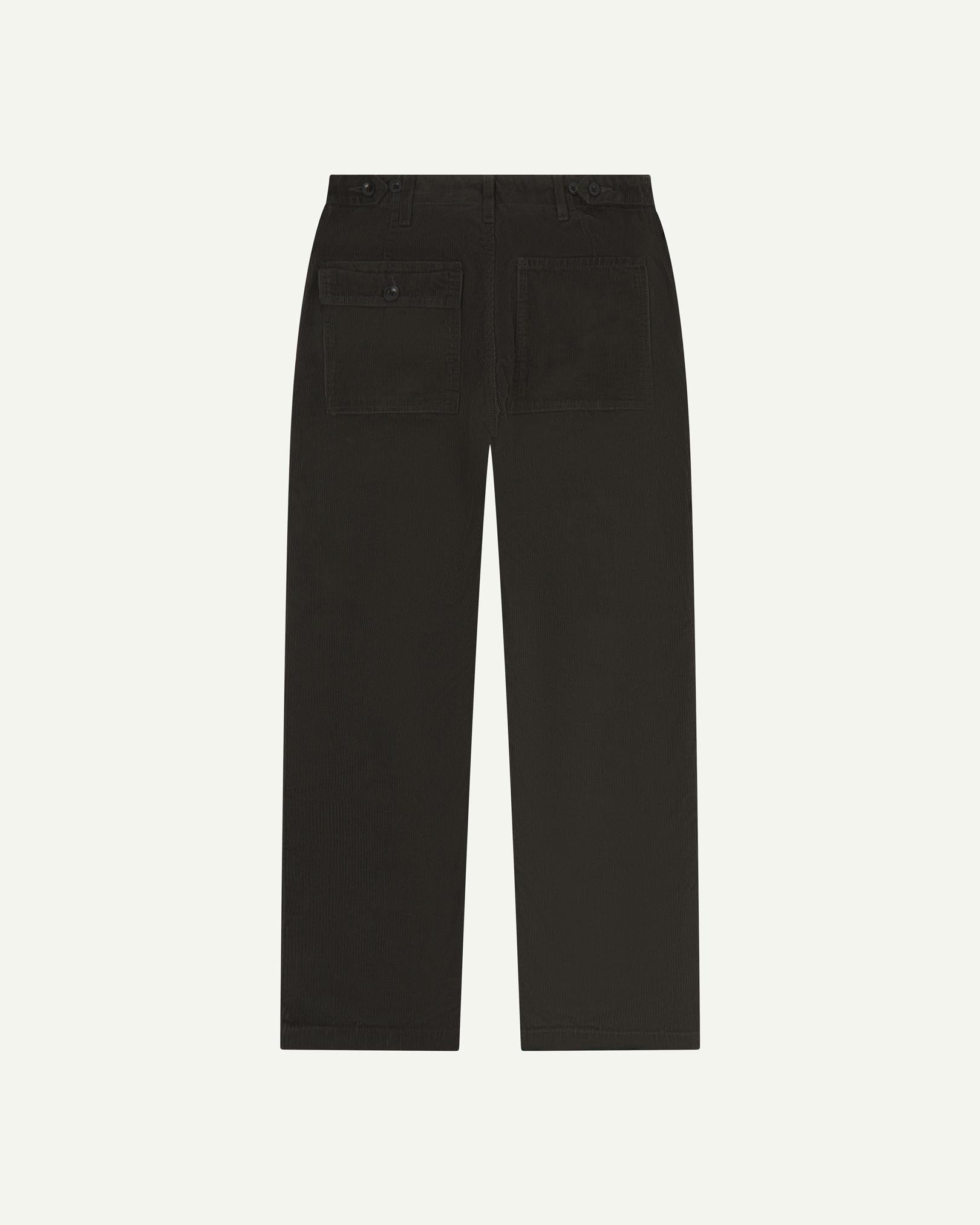 Full length back-view of faded black corduroy 5005 trousers with view of rear pockets, belt loops and tapered leg fit.