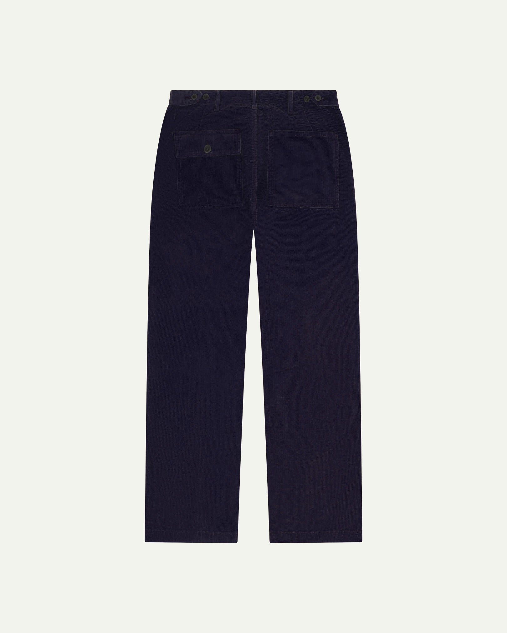 Full length back-view of midnight blue corduroy 5005 trousers with view of rear pockets, belt loops and tapered leg fit.