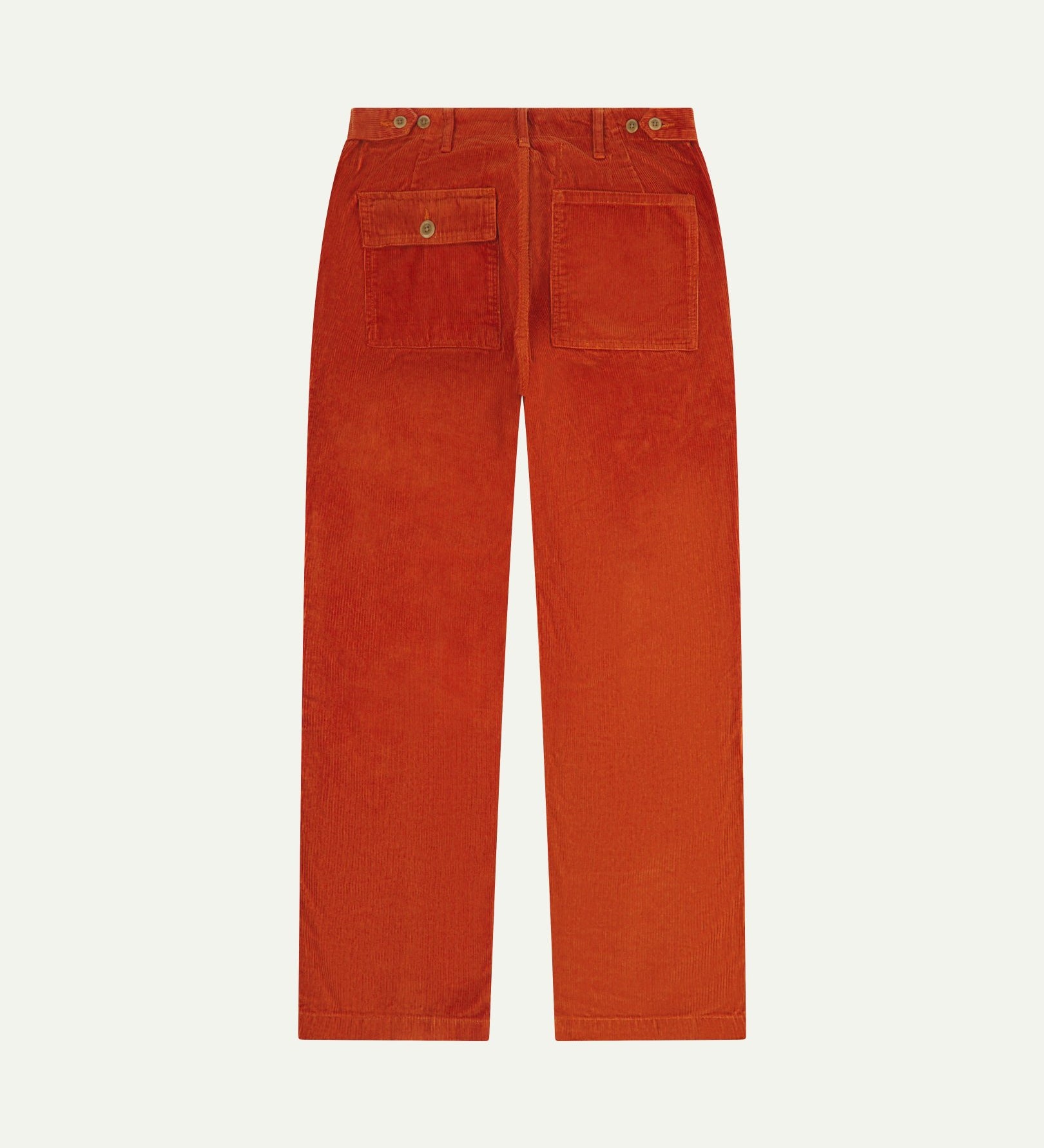 Full length back-view of rust-red corduroy 5005 trousers with view of rear pockets, belt loops and flattering straight leg fit.