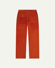 Full length back-view of rust-red corduroy 5005 trousers with view of rear pockets, belt loops and flattering straight leg fit.