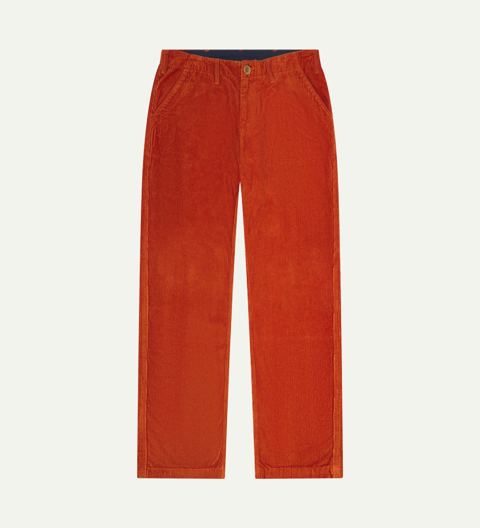 Front flat view of 5005 Uskees men's organic corduroy rust-red workwear pants with view of YKK zip fly and contrasting Corozo buttons.