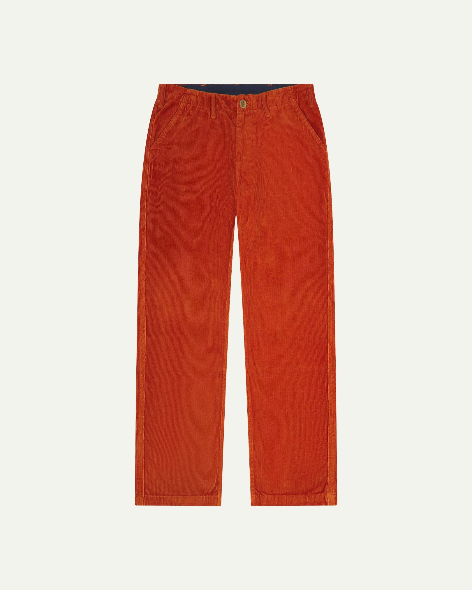 Front flat view of 5005 Uskees men's organic corduroy rust-red workwear pants with view of YKK zip fly and contrasting Corozo buttons.