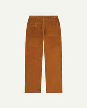 Full length back-view of tan corduroy 5005 trousers with view of rear pockets, belt loops and tapered leg fit.