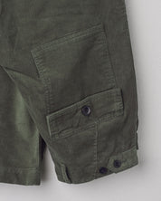 Close-up folded view of #5005 Uskees cord workwear pants in vine green showing triple stitching.